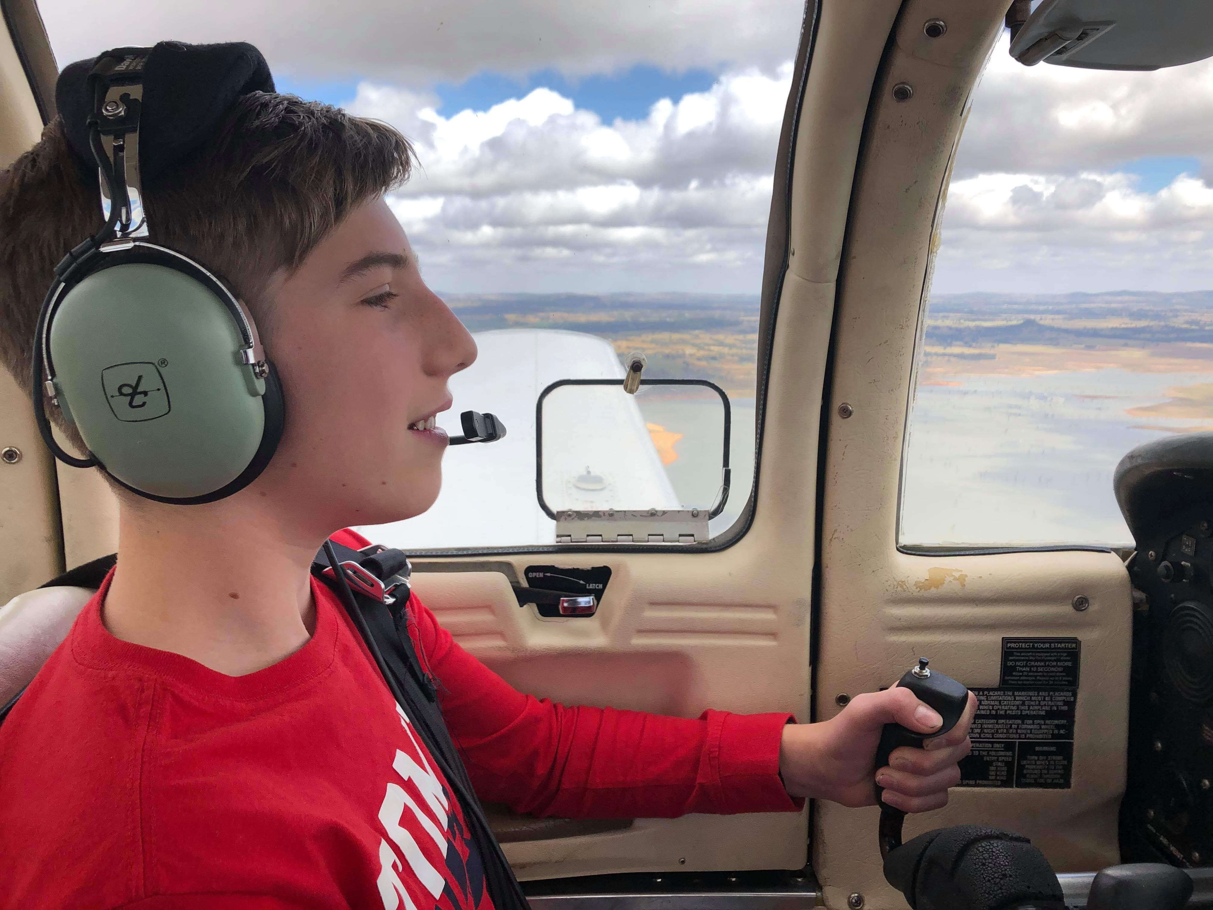 student taking control of flight